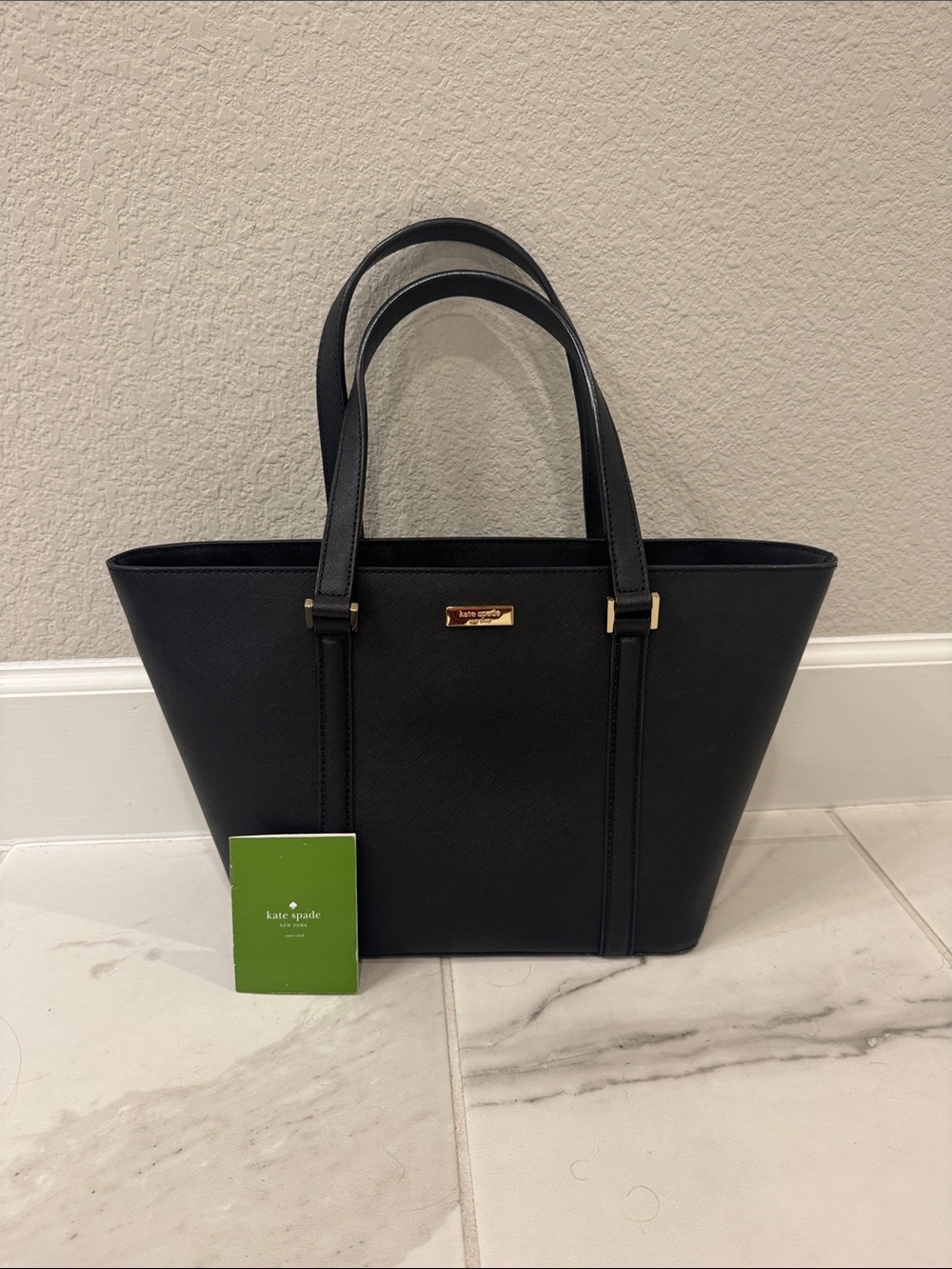 kate spade black leather tote with gold hardware